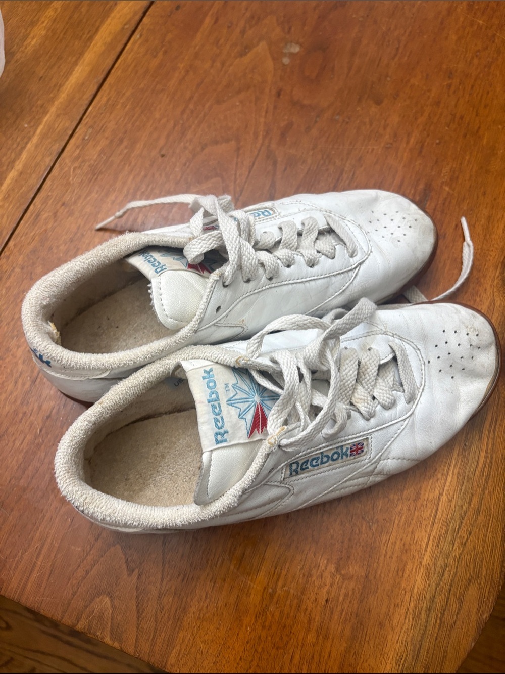 Reebok White Sneakers with Blue & Red Logo Accents